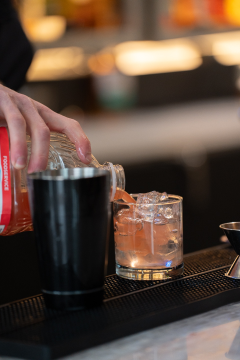 Cocktail being poured